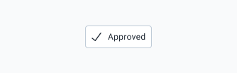 Example button with text and a checkmark icon.